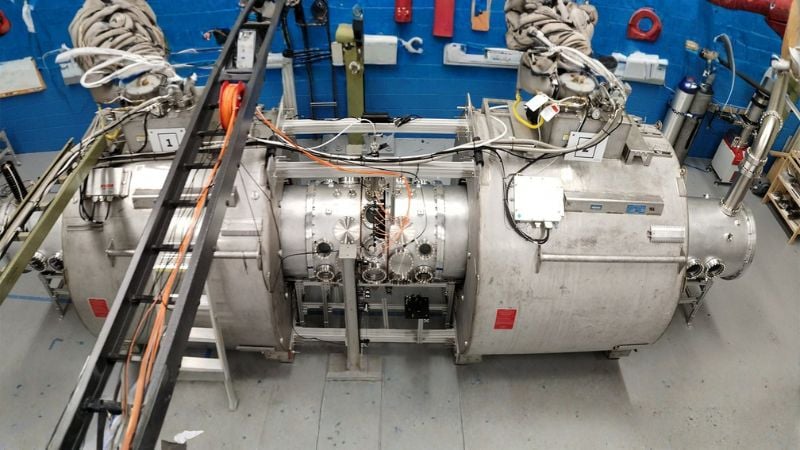 CMFX uses superconducting magnets and a high-voltage central conductor to study rapidly rotating plasma.