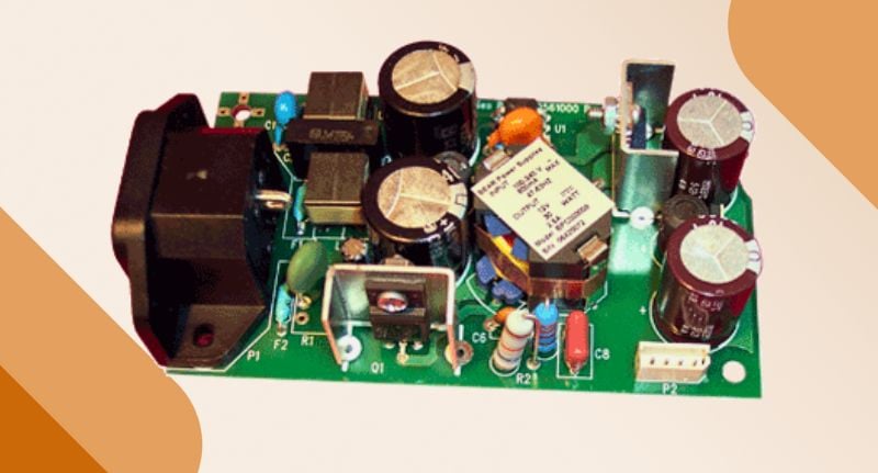 Custom 60-watt AC/DC Bear power supply for a portable medical instrument.