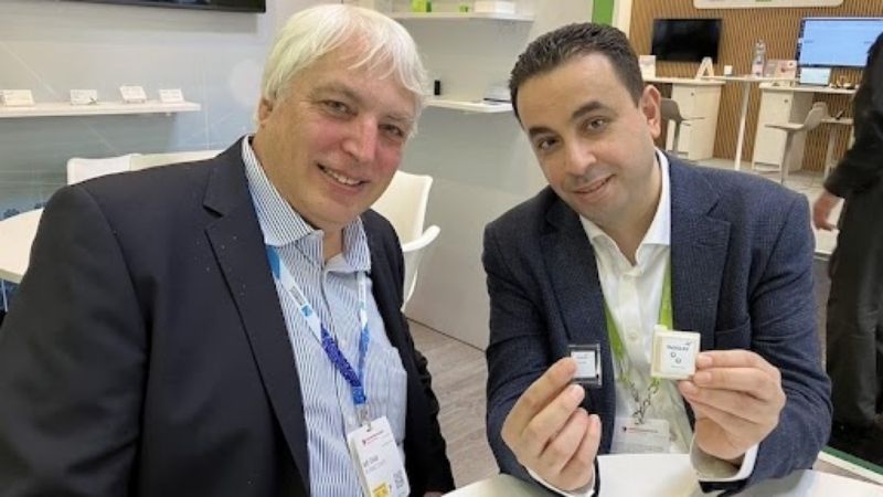 Jeff Child (left), EEPower editor-in-chief, speaks with an industry leader at a 2025 trade show.