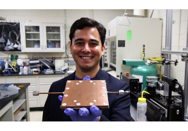 Mojtaba Edalatpour, a research team member of Boreyko’s lab holds up the newly-devised thermal diode.