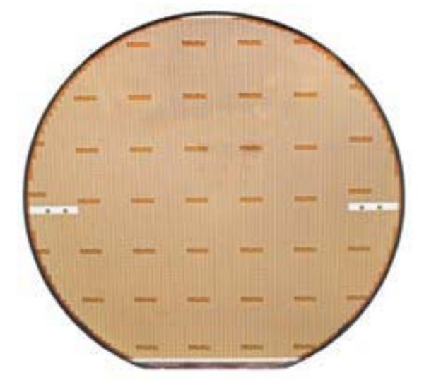 Completed eGaN FET wafer. There are about 10,000 transistors on this wafer. The next step is singulation, where the wafer is saw-cut and the individual transistors that passed testing are separated from failed devices.