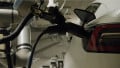 Humans Not Required: Robotic Arms Charge EVs While Parked