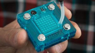 Hydrogen from Nickel, Iron, Cobalt, a Solar Cell and a Supercapacitor