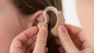 Very Low Input-Voltage Boost Converter Enables Direct Methanol Fuel Cell Hearing Aids 