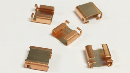High-Current Four-Terminal Shunts for High Sensing Efficiency