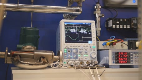 Analytical Relationship Between Feedback Loop Properties and Load Transient Response in Voltage Converters