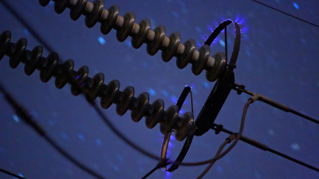 Understanding Corona Discharge in High-Voltage Transmission Lines